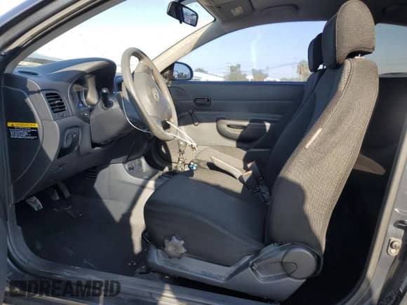 2009 Hyundai Accent GS z VIN KMHCM36C09U130141, wystawiony jako Copart lot #78757034 z przebiegiem 145 482 mil mil oraz Szkoda całkowita • Salvage title. Historia ofert i sprzedaży dostępna na DreamBid. Obrazek 7.