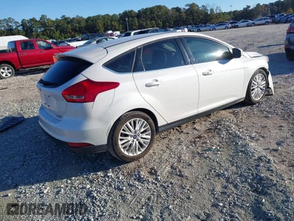 ✅ 2016 Ford Focus Titanium • VIN: 1FADP3N22GL344405 • Lot: 43612764. Listed on IAAI with 60,636 mi. Free auction sales archive from the USA and detailed vehicle history report at DreamBid. Image 4.