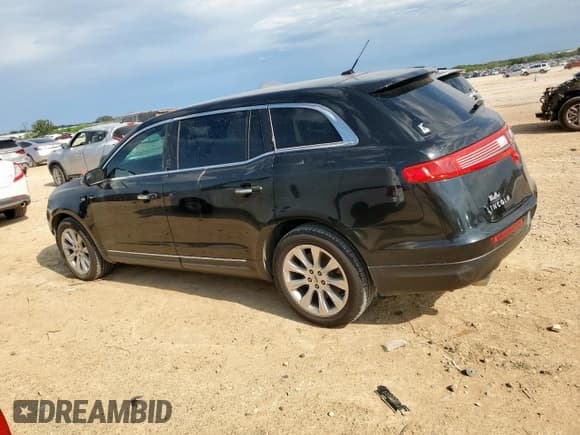 ✅ 2015 Lincoln MKT • VIN: 2LMHJ5FK7FBL02608 • Lot: 64018185. Listed on Copart with 101,161 mi. Free auction sales archive from the USA and detailed vehicle history report at DreamBid. Image 2.