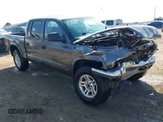 2002 Dodge Dakota SLT с VIN 1B7HG48N72S535842, выставлен на аукционе IAAI как лот 42152522 с пробегом Не указан миль и . История ставок и продаж доступна на DreamBid. Изображение 1.