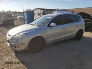 2009 Hyundai Elantra Touring z VIN KMHDC86E09U038792, wystawiony jako Copart lot #84791125 z przebiegiem 172 061 mil mil oraz Szkoda całkowita • Salvage title. Historia ofert i sprzedaży dostępna na DreamBid. Obrazek 1.