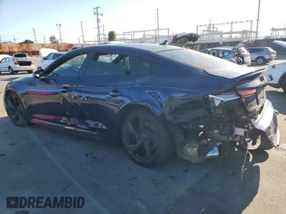 ✅ 2022 Audi RS 5 Sportback • VIN: WUAAWCF53NA902055 • Lot: 52702634. Listed on Copart with 25,128 mi. Free auction sales archive from the USA and detailed vehicle history report at DreamBid. Image 2.