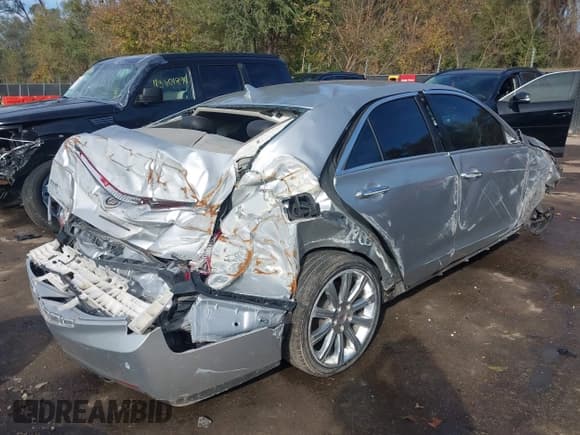 ✅ 2014 Cadillac ATS Luxury AWD • VIN: 1G6AH5SX1E0105774 • Лот: 43593748. Опубликован ранее на IAAI с пробегом 59 326 миль. Бесплатный доступ к архиву аукционных продаж из США и подробный отчёт об истории автомобиля на DreamBid. Изображение 4.