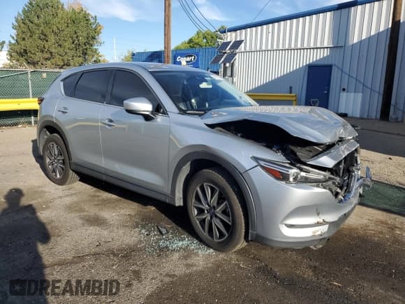 ✅ 2018 Mazda CX-5 Grand Touring • VIN: JM3KFBDM9J0371005 • Lot: 84292645. Listed on Copart with 118,617 mi. Free auction sales archive from the USA and detailed vehicle history report at DreamBid. Image 4.