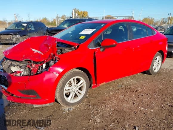 ✅ 2018 Chevrolet Cruze LT • VIN: 1G1BE5SM0J7162574 • Lot: 43492917. Listed on IAAI with 115,431 mi. Free auction sales archive from the USA and detailed vehicle history report at DreamBid. Image 2.