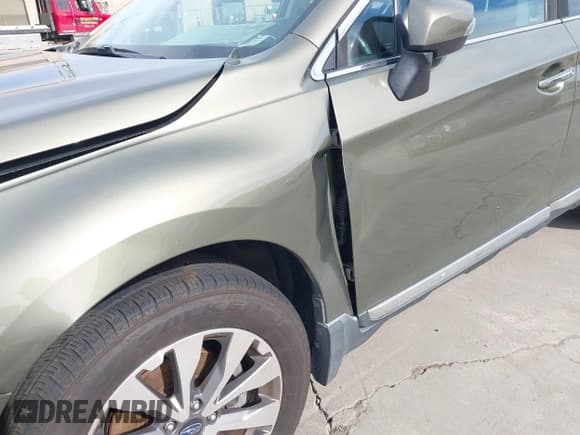 ✅ 2017 Subaru Outback Touring • VIN: 4S4BSETCXH3371887 • Lot: 41692515. Listed on IAAI with 57,039 mi. Free auction sales archive from the USA and detailed vehicle history report at DreamBid. Image 17.