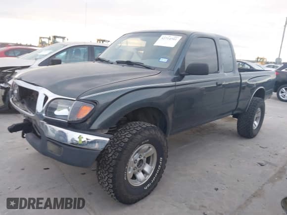 ✅ 1998 Toyota Tacoma • VIN: 4TAWN72N7WZ076988 • Лот: 42714581. Опубликован ранее на IAAI с пробегом 219 164 миль. Бесплатный доступ к архиву аукционных продаж из США и подробный отчёт об истории автомобиля на DreamBid. Изображение 2.