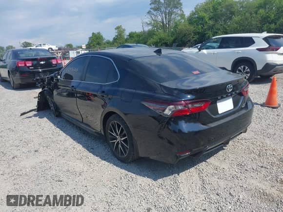 2022 Toyota Camry SE with VIN 4T1G11BK1NU053821, listed as a IAAI auction lot 42936203 with 41,547 mi miles and . Bid and sale history available at DreamBid. Image 3.