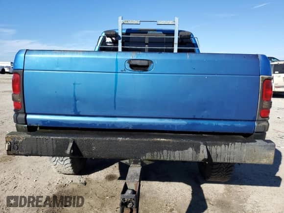 2000 Dodge 1500 с VIN 3B7HF13Z9YG148639, выставлен на аукционе Copart как лот 87698355 с пробегом 273 328 миль миль и Списание • Salvage title. История ставок и продаж доступна на DreamBid. Изображение 6.