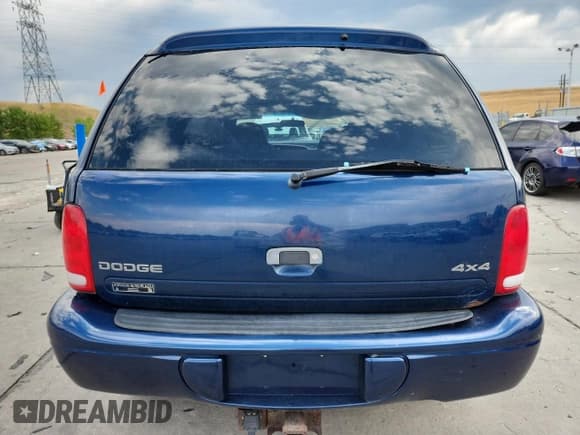 ✅ 2000 Dodge Durango • VIN: 1B4HS28N0YF121982 • Lot: 69323595. Wystawiony na Copart z przebiegiem 95 659 mil. Bezpłatny archiwum sprzedaży aukcyjnych z USA i szczegółowy raport historii pojazdu na DreamBid. Zdjęcie 6.