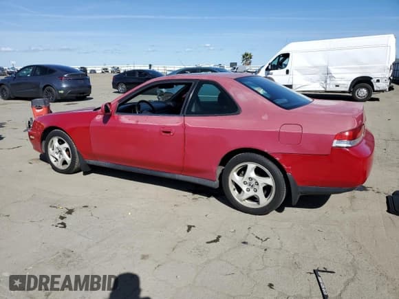 ✅ 1997 Honda Prelude • VIN: JHMBB614XVC000826 • Лот: 49745955. Опубликован ранее на Copart с пробегом 224 134 миль. Бесплатный доступ к архиву аукционных продаж из США и подробный отчёт об истории автомобиля на DreamBid. Изображение 2.