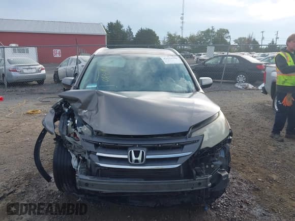 ✅ 2014 Honda CR-V EX-L • VIN: 2HKRM4H72EH660281 • Lot: 43232330. Listed on IAAI with 130,253 mi. Free auction sales archive from the USA and detailed vehicle history report at DreamBid. Image 13.