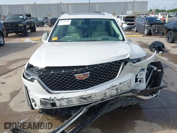 ✅ 2023 Cadillac XT6 FWD Premium Luxury • VIN: 1GYKPCRS5PZ218638 • Лот: 42714597. Опубликован ранее на IAAI с пробегом 29 654 миль. Бесплатный доступ к архиву аукционных продаж из США и подробный отчёт об истории автомобиля на DreamBid. Изображение 12.