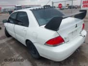 ✅ 2004 Mitsubishi Lancer ES • VIN: JA3AJ26E24U010333 • Lot: 42712708. Listed on IAAI with 249,376 mi. Free auction sales archive from the USA and detailed vehicle history report at DreamBid. Image 3.