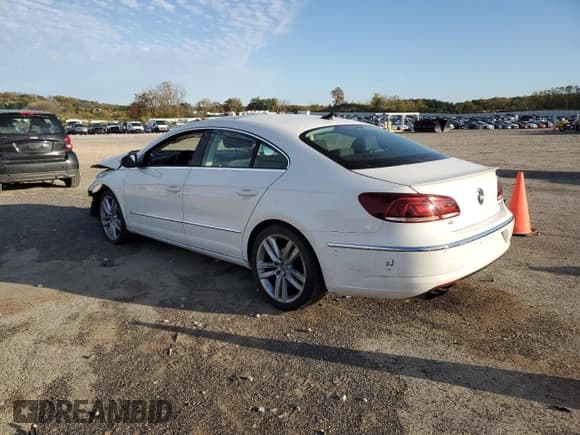 ✅ 2014 Volkswagen CC Executive • VIN: WVWRN7AN3EE513913 • Lot: 82604685. Listed on Copart with 120,862 mi. Free auction sales archive from the USA and detailed vehicle history report at DreamBid. Image 2.
