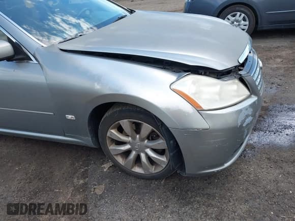 ✅ 2007 Infiniti M x • VIN: JNKAY01FX7M457416 • Lot: 42220743. Listed on IAAI with 207,464 mi. Free auction sales archive from the USA and detailed vehicle history report at DreamBid. Image 12.