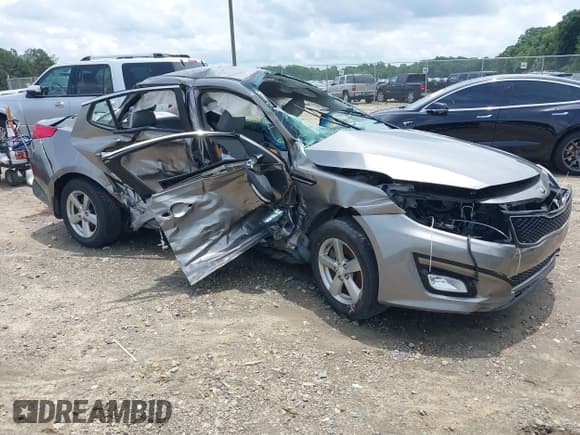 ✅ 2014 Kia Optima LX • VIN: 5XXGM4A72EG299471 • Lot: 42471733. Listed on IAAI with 162,443 mi. Free auction sales archive from the USA and detailed vehicle history report at DreamBid. Image 1.