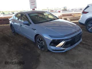 ✅ 2025 Hyundai Sonata SEL • VIN: KMHL64JA7SA514401 • Лот: 43622234. Опубликован ранее на IAAI с пробегом 7 142 миль. Бесплатный доступ к архиву аукционных продаж из США и подробный отчёт об истории автомобиля на DreamBid. Изображение 1.