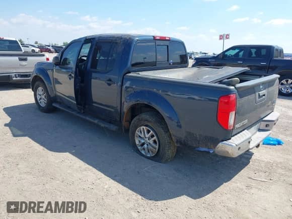 2015 Nissan Frontier SV z VIN 1N6AD0ER6FN702722, wystawiony jako IAAI lot #43340937 z przebiegiem 138 924 mil mil oraz . Historia ofert i sprzedaży dostępna na DreamBid. Obrazek 3.