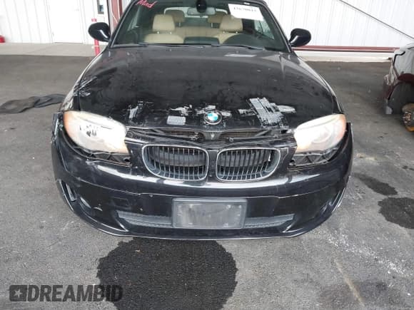 ✅ 2013 BMW 1 Series 128i • VIN: WBAUN1C55DVR00916 • Lot: 43670015. Listed on IAAI with 94,510 mi. Free auction sales archive from the USA and detailed vehicle history report at DreamBid. Image 6.