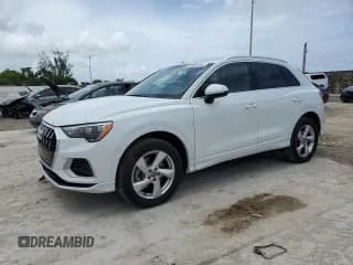 ✅ 2020 Audi Q3 Premium • VIN: WA1AECF36L1074542 • Lot: 65404345. Wystawiony na Copart z przebiegiem 24 061 mil. Bezpłatny archiwum sprzedaży aukcyjnych z USA i szczegółowy raport historii pojazdu na DreamBid. Zdjęcie 1.