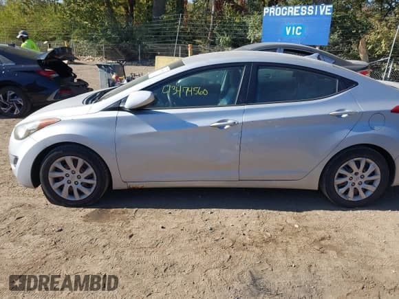 ✅ 2012 Hyundai Elantra GLS • VIN: 5NPDH4AE9CH089974 • Lot: 43474560. Listed on IAAI with 174,190 mi. Free auction sales archive from the USA and detailed vehicle history report at DreamBid. Image 14.