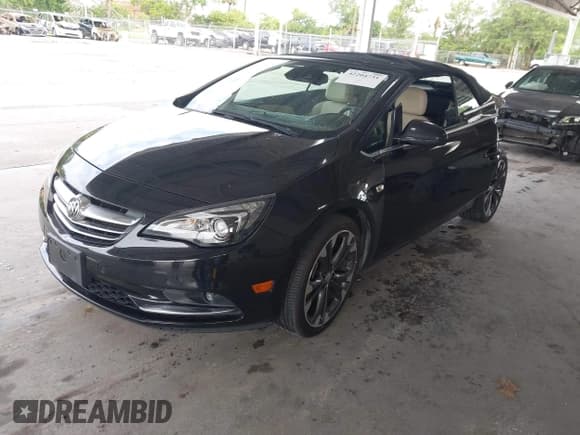 ✅ 2016 Buick Cascada Premium • VIN: W04WT3N5XGG072858 • Лот: 42204731. Опубликован ранее на IAAI с пробегом 75 309 миль. Бесплатный доступ к архиву аукционных продаж из США и подробный отчёт об истории автомобиля на DreamBid. Изображение 2.