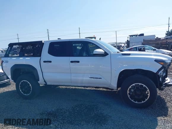 ✅ 2024 Toyota Tacoma TRD Sport Hybrid • VIN: 3TYLC5LN3RT001392 • Lot: 42401518. Listed on IAAI with 3,310 mi. Free auction sales archive from the USA and detailed vehicle history report at DreamBid. Image 14.