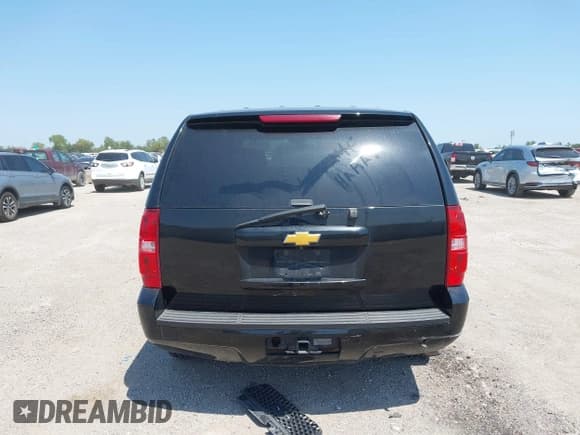 ✅ 2014 Chevrolet Tahoe Commercial • VIN: 1GNLC2E07ER210629 • Lot: 43138340. Listed on IAAI with 190,691 mi. Free auction sales archive from the USA and detailed vehicle history report at DreamBid. Image 16.