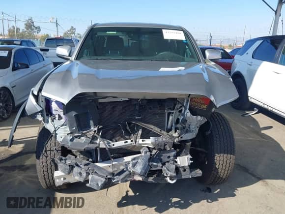 2022 Toyota Tacoma SR5 with VIN 3TMAZ5CN9NM186656, listed as a IAAI auction lot 43253480 with 25,540 mi miles and . Bid and sale history available at DreamBid. Image 12.