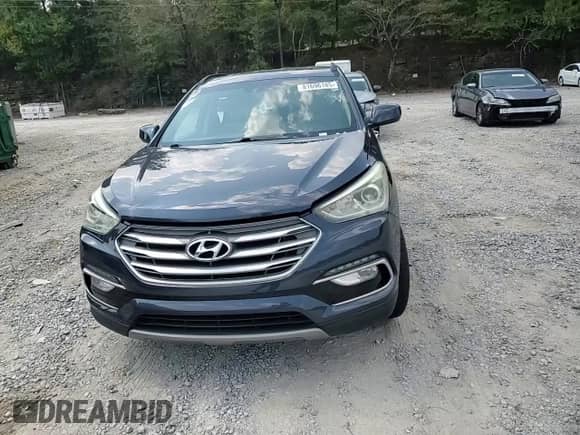 2017 Hyundai Santa Fe 2.4L с VIN 5NMZU3LBXHH018334, выставлен на аукционе Copart как лот 81696185 с пробегом 121 529 миль миль и Списание • Salvage title. История ставок и продаж доступна на DreamBid. Изображение 13.