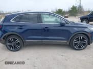 ✅ 2018 Lincoln MKC Black Label • VIN: 5LMTJ4DHXJUL12752 • Лот: 42134844. Опубликован ранее на IAAI с пробегом 103 163 миль. Бесплатный доступ к архиву аукционных продаж из США и подробный отчёт об истории автомобиля на DreamBid. Изображение 13.