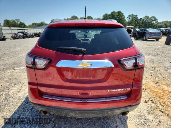 ✅ 2014 Chevrolet Traverse LTZ • VIN: 1GNKRJKD6EJ246936 • Lot: 71836225. Wystawiony na Copart z przebiegiem 157 866 mil. Bezpłatny archiwum sprzedaży aukcyjnych z USA i szczegółowy raport historii pojazdu na DreamBid. Zdjęcie 6.