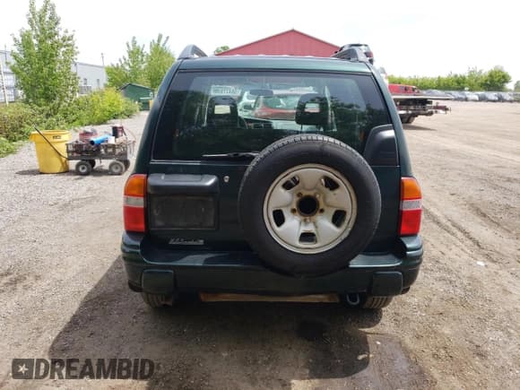 ✅ 2003 Suzuki Vitara JLX • VIN: 2S3TD52V136101732 • Лот: 58477845. Опубликован ранее на Copart с пробегом 105 628 миль. Бесплатный доступ к архиву аукционных продаж из США и подробный отчёт об истории автомобиля на DreamBid. Изображение 6.