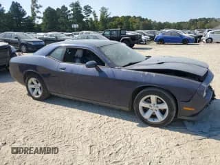 ✅ 2014 Dodge Challenger SXT • VIN: 2C3CDYAG2EH179760 • Lot: 74294704. Wystawiony na Copart z przebiegiem 95 649 mil. Bezpłatny archiwum sprzedaży aukcyjnych z USA i szczegółowy raport historii pojazdu na DreamBid. Zdjęcie 4.