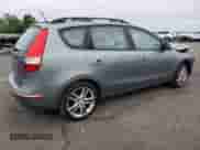 2010 Hyundai Elantra SE with VIN KMHDC8AE6AU068617, listed as a Copart auction lot 69657295 with 84,999 mi miles and Salvage title. Bid and sale history available at DreamBid. Image 3.