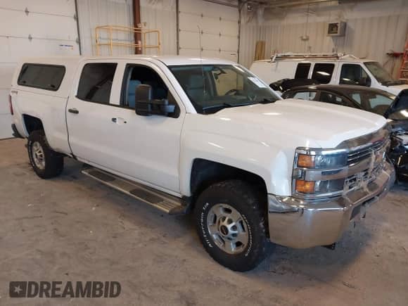 2016 Chevrolet Silverado 2500HD Work Truck z VIN 1GC1KUEG8GF104724, wystawiony jako IAAI lot #43374467 z przebiegiem Nie podano mil oraz . Historia ofert i sprzedaży dostępna na DreamBid. Obrazek 1.