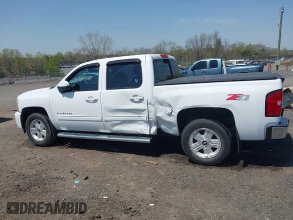 ✅ 2013 Chevrolet Silverado 1500 LTZ • VIN: 3GCPKTE24DG123063 • Lot: 42061675. Wystawiony na IAAI z przebiegiem 221 813 mil. Bezpłatny archiwum sprzedaży aukcyjnych z USA i szczegółowy raport historii pojazdu na DreamBid. Zdjęcie 14.