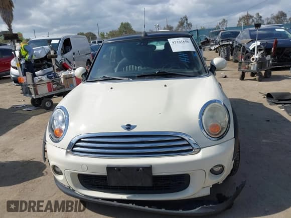 ✅ 2012 MINI Convertible • VIN: WMWZN3C53CT134194 • Lot: 42261686. Listed on IAAI with 104,099 mi. Free auction sales archive from the USA and detailed vehicle history report at DreamBid. Image 12.