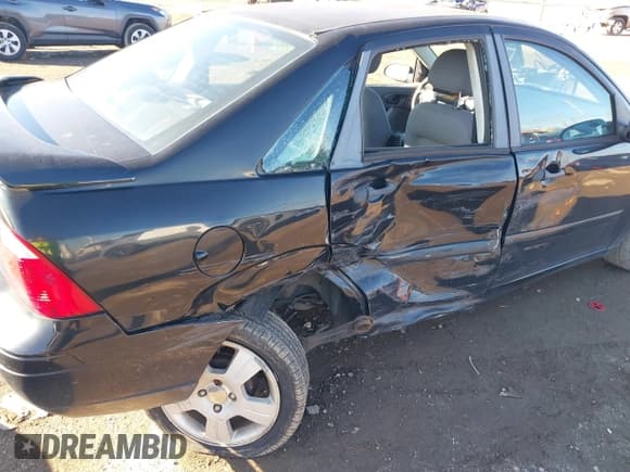 ✅ 2007 Ford Focus S • VIN: 1FAHP34N07W314508 • Lot: 43395002. Listed on IAAI with 164,603 mi. Free auction sales archive from the USA and detailed vehicle history report at DreamBid. Image 6.