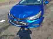 2016 Chevrolet Cruze LT z VIN 1G1BE5SM3G7251421, wystawiony jako IAAI lot #43294353 z przebiegiem 124 676 mil mil oraz . Historia ofert i sprzedaży dostępna na DreamBid. Obrazek 6.