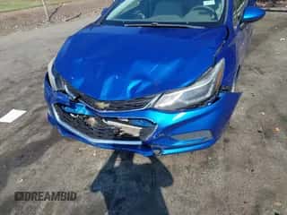 2016 Chevrolet Cruze LT z VIN 1G1BE5SM3G7251421, wystawiony jako IAAI lot #43294353 z przebiegiem 124 676 mil mil oraz . Historia ofert i sprzedaży dostępna na DreamBid. Obrazek 6.