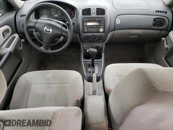 ✅ 2002 Mazda Protege DX • VIN: JM1BJ225120627724 • Lot: 80785684. Wystawiony na Copart z przebiegiem 104 013 mil. Bezpłatny archiwum sprzedaży aukcyjnych z USA i szczegółowy raport historii pojazdu na DreamBid. Zdjęcie 8.