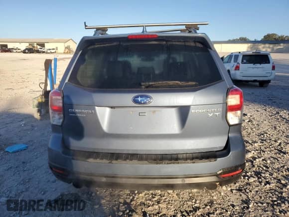 2018 Subaru Forester Touring с VIN JF2SJGWC4JH535224, выставлен на аукционе Copart как лот 86684145 с пробегом 100 969 миль миль и Списание • Salvage title. История ставок и продаж доступна на DreamBid. Изображение 6.