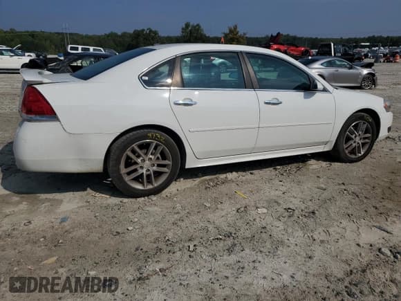 ✅ 2014 Chevrolet Impala LTZ • VIN: 2G1WC5E36E1151835 • Lot: 81037395. Listed on Copart with 149,301 mi. Free auction sales archive from the USA and detailed vehicle history report at DreamBid. Image 3.