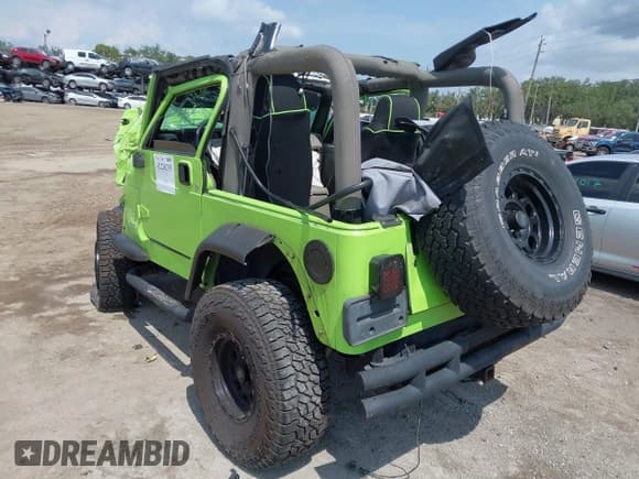 ✅ 2004 Jeep Wrangler Sahara • VIN: 1J4FA59S44P704878 • Лот: 42226255. Опубликован ранее на IAAI с пробегом 88 886 миль. Бесплатный доступ к архиву аукционных продаж из США и подробный отчёт об истории автомобиля на DreamBid. Изображение 3.