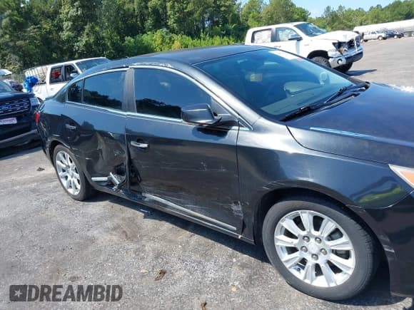 ✅ 2013 Buick LaCrosse Leather • VIN: 1G4GC5ER2DF264216 • Лот: 42983950. Опубликован ранее на IAAI с пробегом 196 429 миль. Бесплатный доступ к архиву аукционных продаж из США и подробный отчёт об истории автомобиля на DreamBid. Изображение 6.