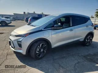 ✅ 2023 Chevrolet Bolt EV 2LT • VIN: 1G1FX6S03P4206396 • Lot: 82539245. Listed on Copart with 34,663 mi. Free auction sales archive from the USA and detailed vehicle history report at DreamBid. Image 1.