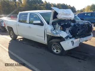 2018 Chevrolet Silverado 1500 LT z VIN 3GCUKREC3JG633219, wystawiony jako IAAI lot #43452248 z przebiegiem Nie podano mil oraz . Historia ofert i sprzedaży dostępna na DreamBid. Obrazek 1.