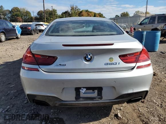 ✅ 2015 BMW 6 Series 650i xDrive • VIN: WBAYM1C51FD325274 • Лот: 82352615. Опубликован ранее на Copart с пробегом 146 468 миль. Бесплатный доступ к архиву аукционных продаж из США и подробный отчёт об истории автомобиля на DreamBid. Изображение 6.